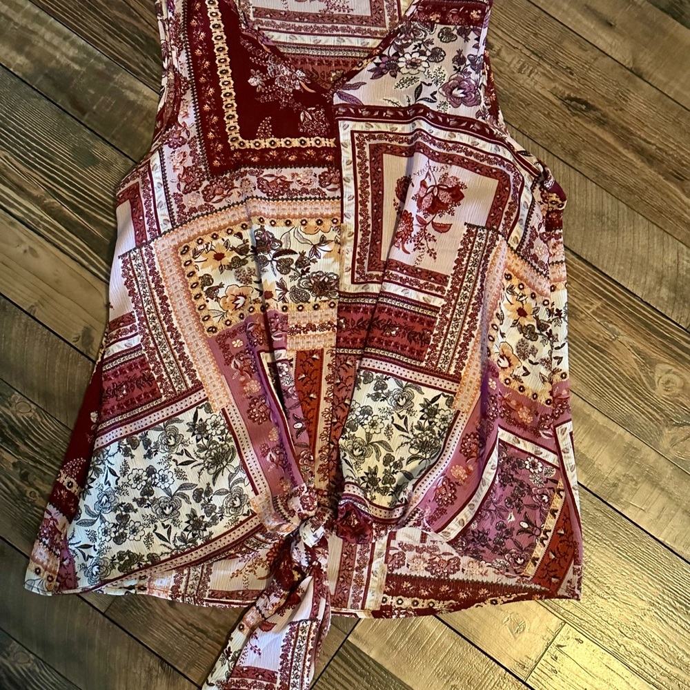 Bran new tank top! Over sized. Ties in the front!